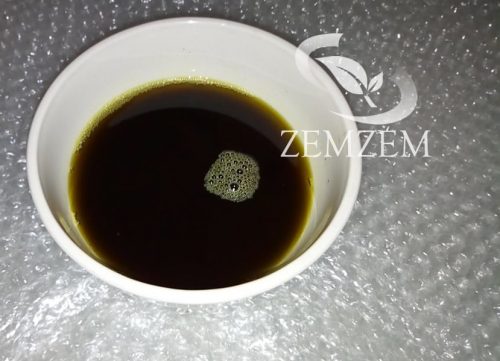 Unfiltered Ethiopian black seed oil before the 3-day gravity settling process